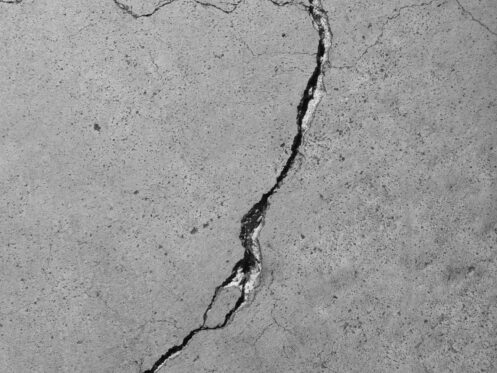 Cracked concrete surface close-up