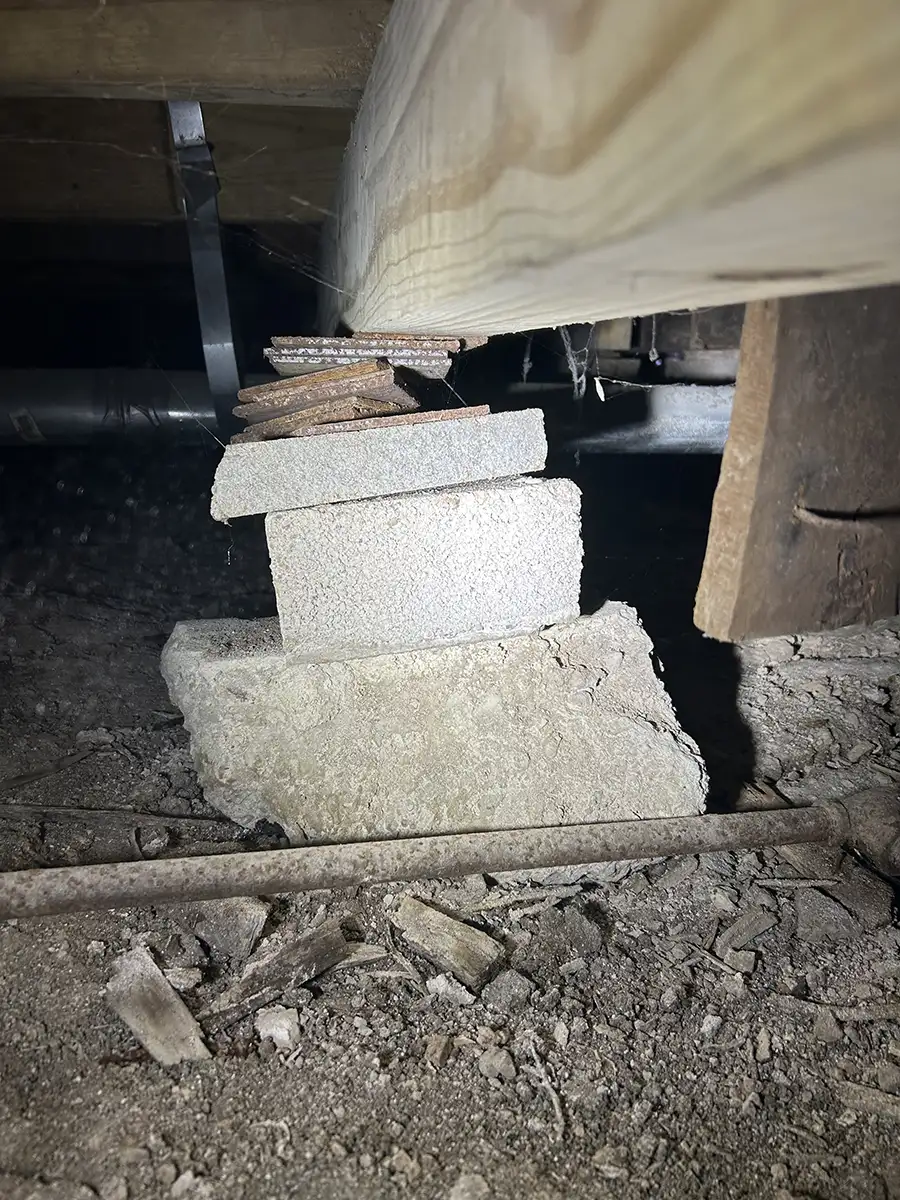 Bad Pad & Block bad foundation patch work in client's crawlspace