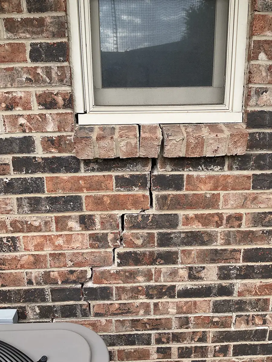 Brick Crack 2 cracked brick under window of clients home